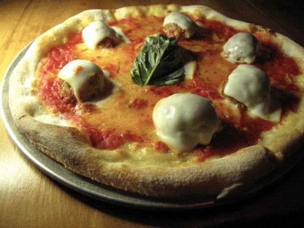 Gusto 101 puts plump meatballs covered in cheese on a pizza!