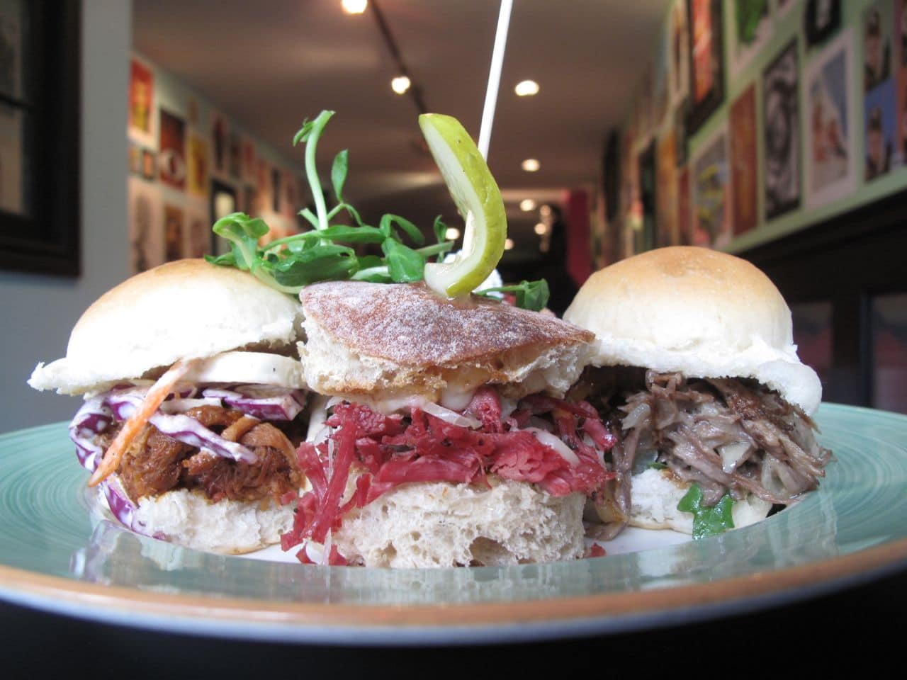 Slider Sampler at The Early Bird London featuring braised duck, smoked meat and pulled pork.