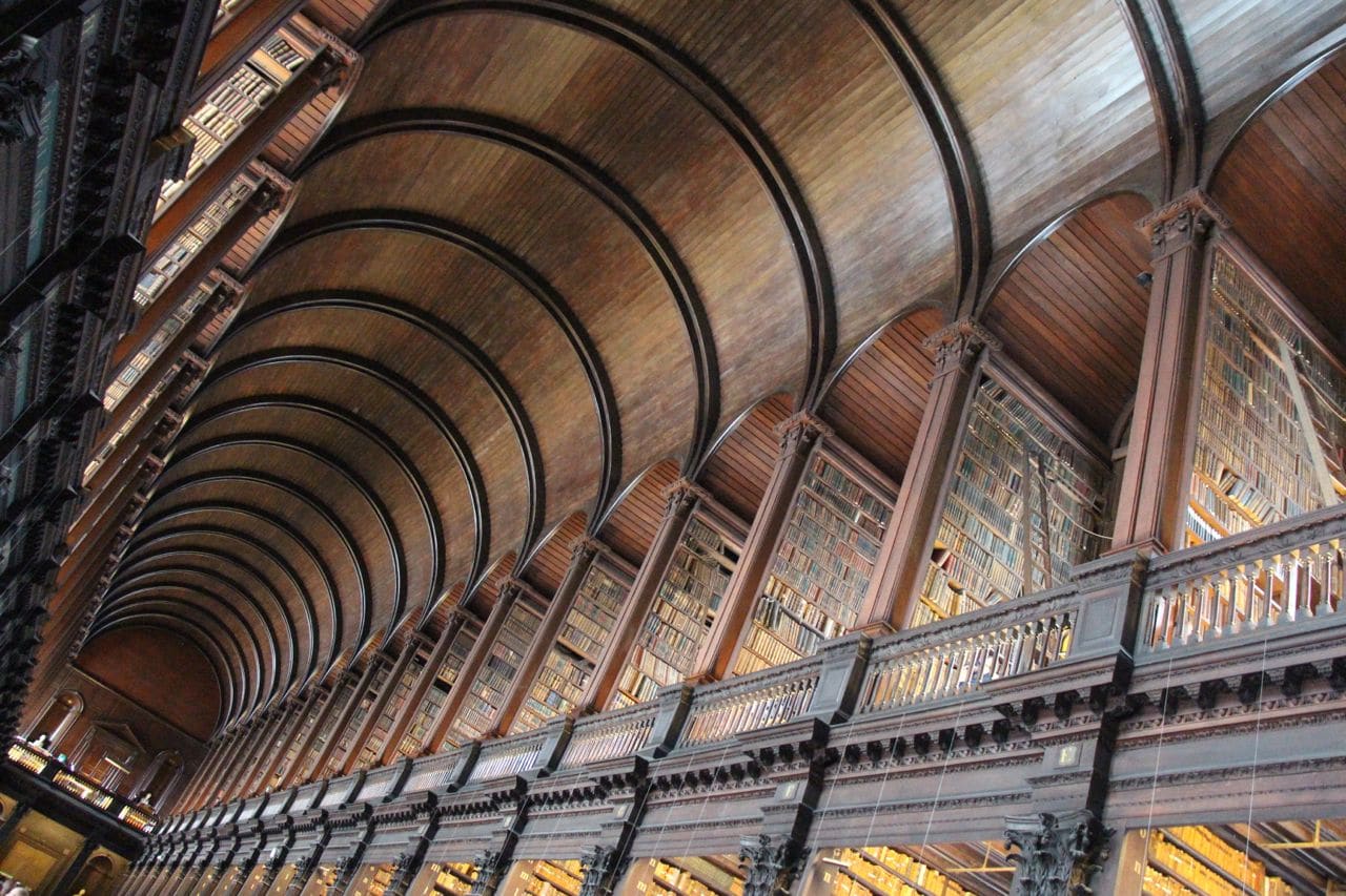 Stroll through Dublin's iconic Trinity College Library.