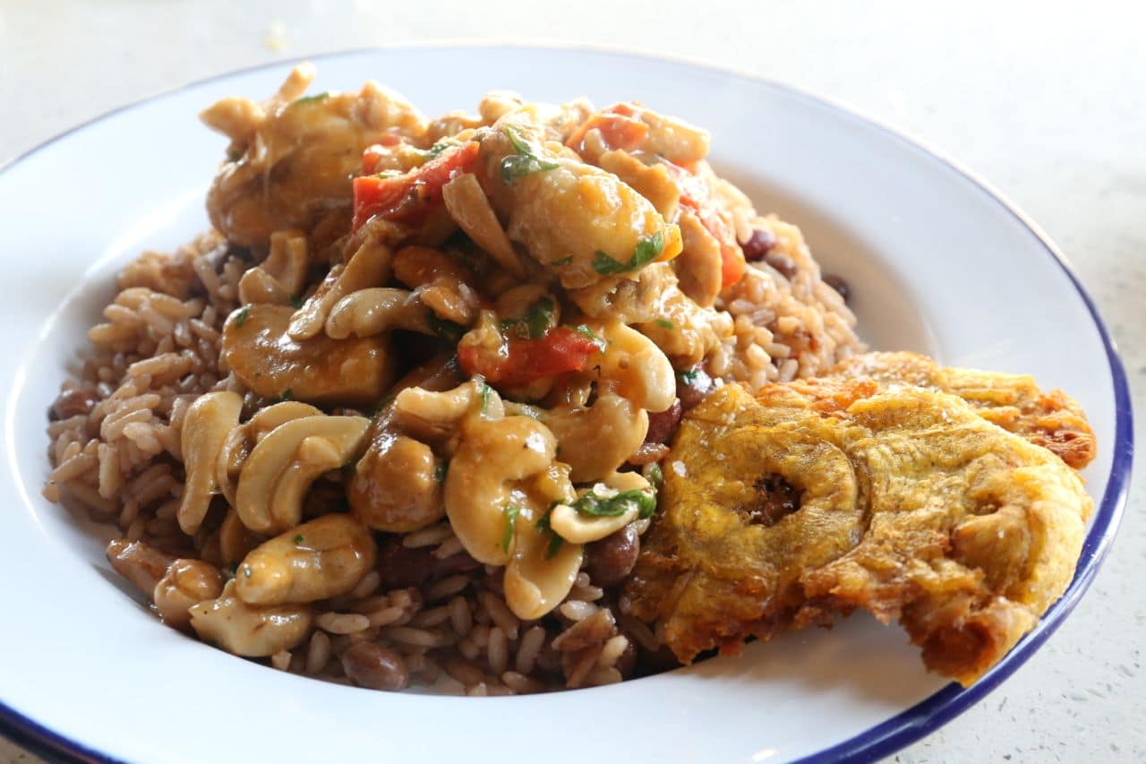 Cashew Chicken with Rice and Beans at Rhum Corner.