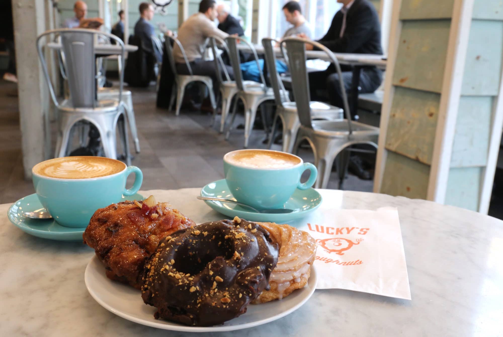 Vancouver food lovers rave for the coffee and donuts at 49th Parallel Coffee.