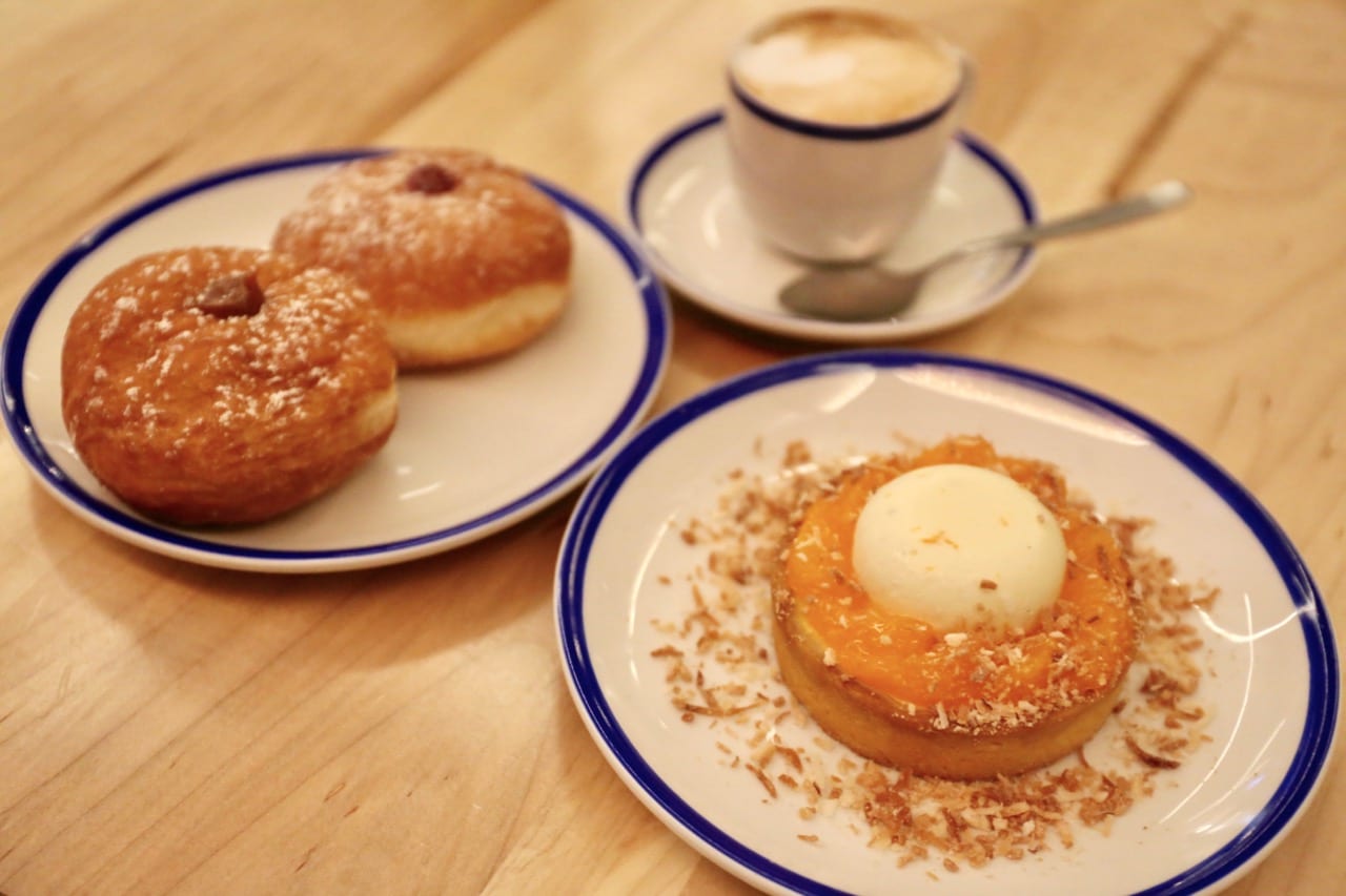 Dessert at Amano Pasta featuring My Little Clementine Tart and Italian donut duo.