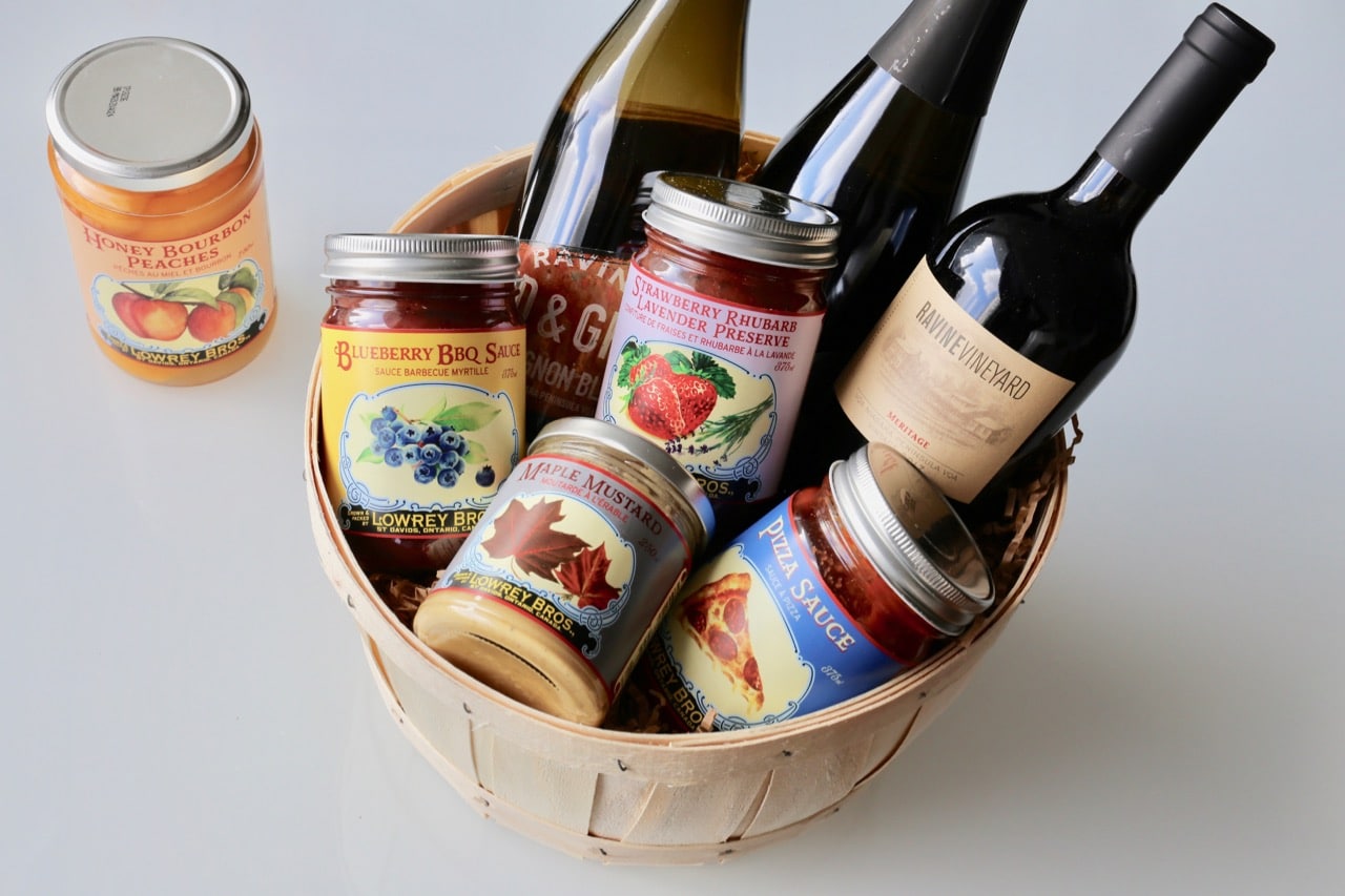 Ravine Vineyard's gift basket filled with wine and preserves. 