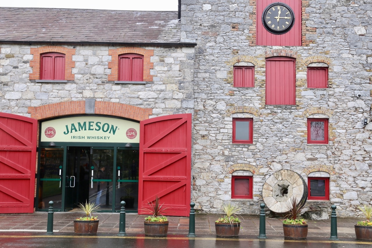 Skip through the big red doors for your Jameson Distillery Tour.