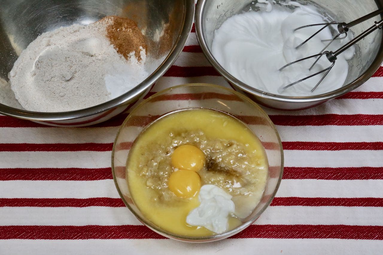 Prepare oat flour pancakes in 3 bowls: dry ingredients, wet ingredients and whipped egg white.