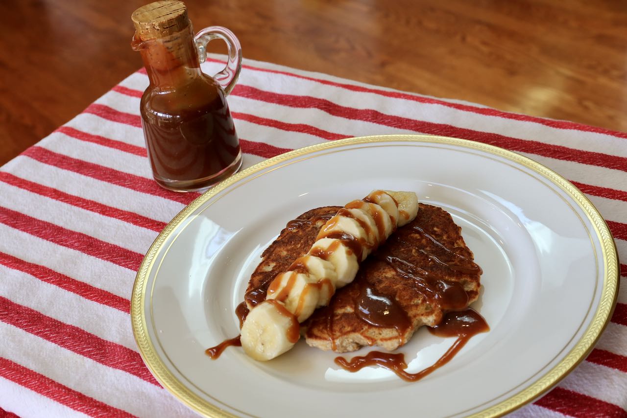 Serve these gluten-free oat flour pancakes with sliced bananas and homemade caramel.