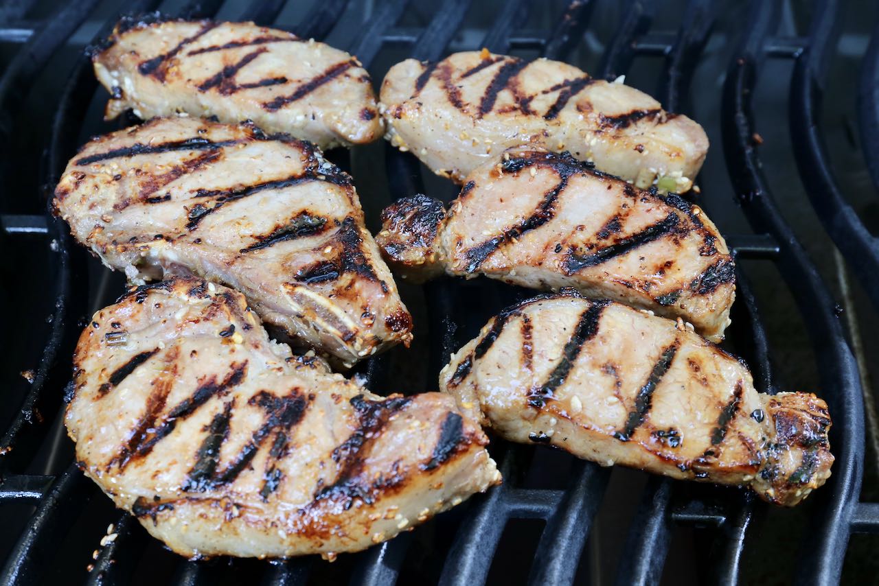 Sear Vietnamese Grilled Pork on both side in a hot barbecue to achieve attractive grill marks.