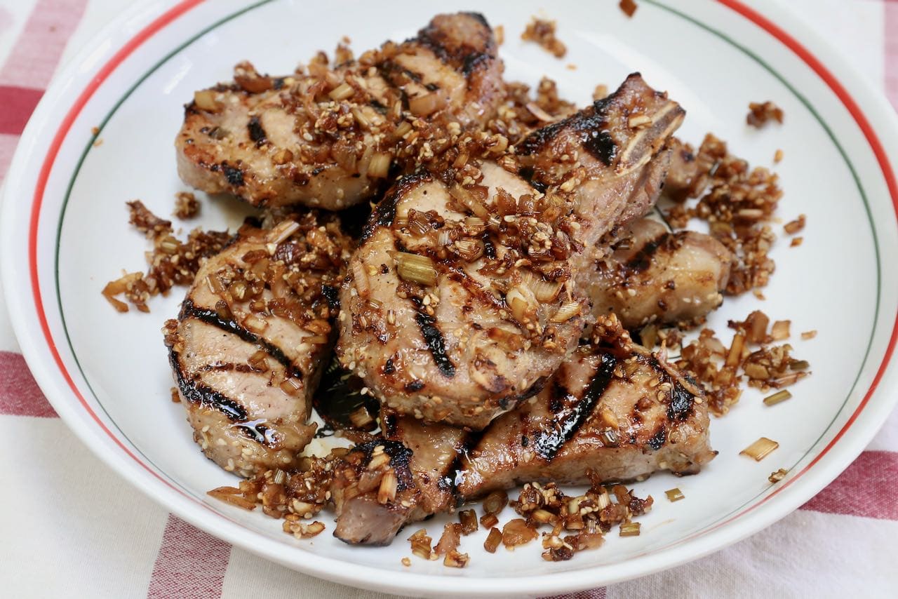 Fry the leftover Vietnamese Grilled Pork marinade in a skillet until shallot and sesame seed mixture are crunchy.