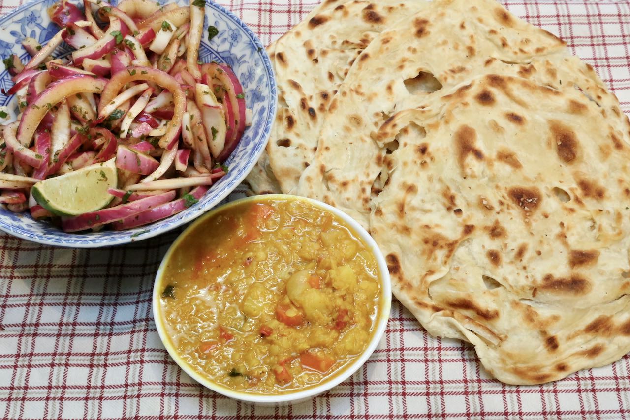 Serve Indian Onion Salad with curries and dal. 