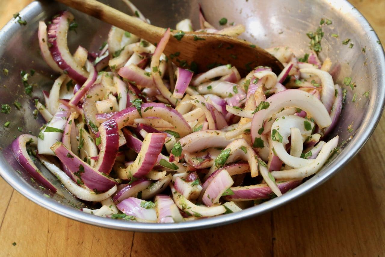 Once combined store Indian Onion Salad in the fridge and allow to marinate.