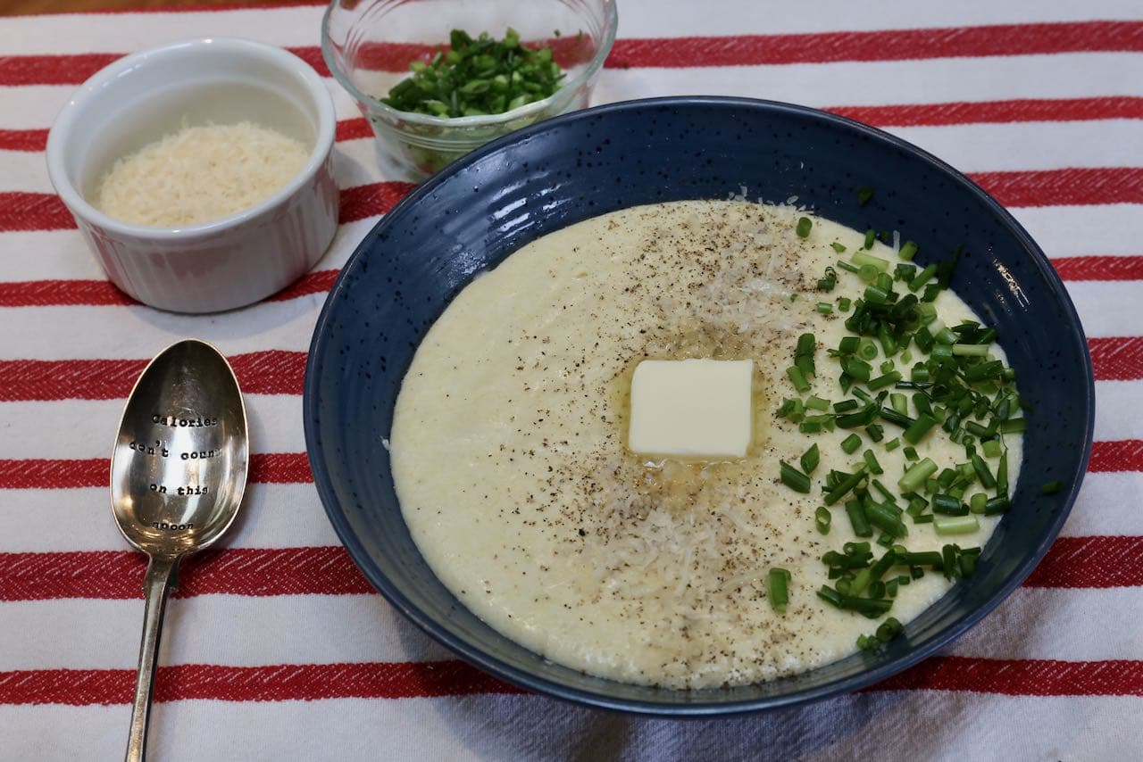 Serve Italian porridge with cold butter, chives, salt and pepper. 