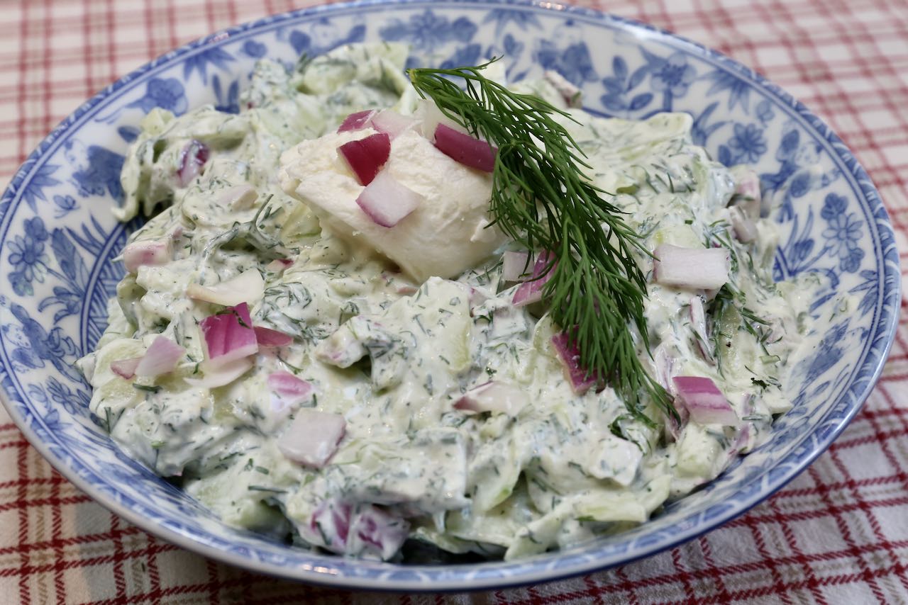 Serve Polish Cucumber Salad with pierogies, cabbage rolls and beet soup.