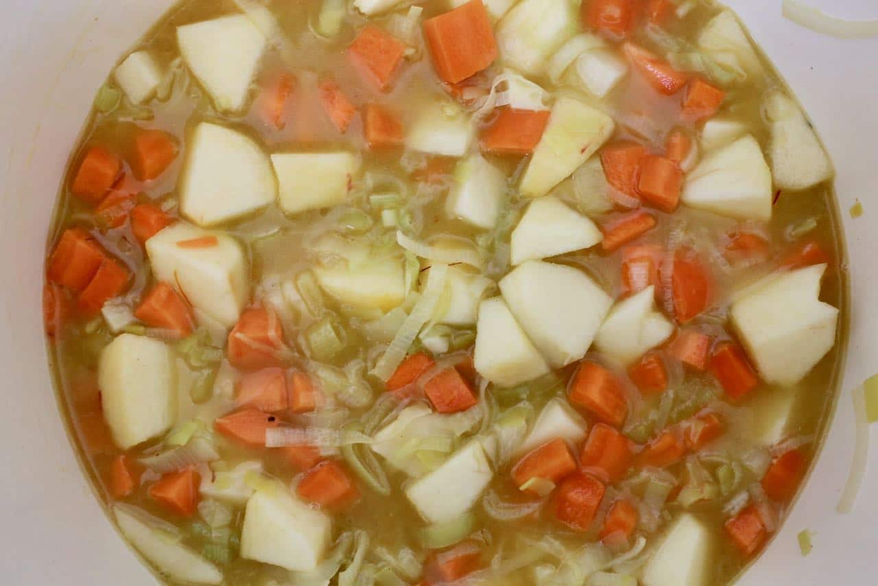 Simmer Carrot and Leek Soup in a cover dutch oven for 20 minutes or until vegetables are tender.