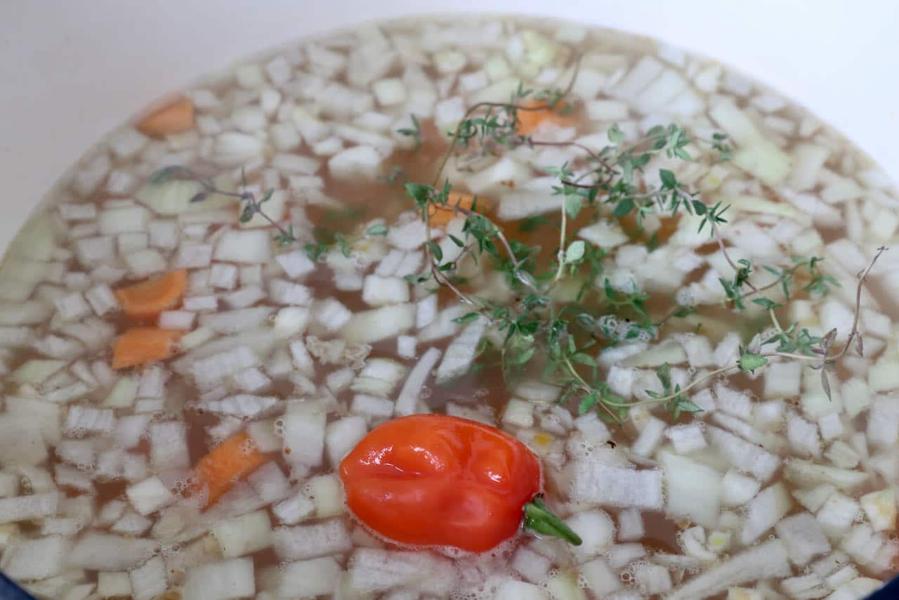 Flavour Jamaican Chicken Soup with Scotch Bonnet Pepper, thyme and all spice.