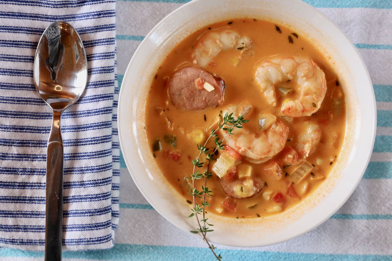 Serve our easy Cajun Cream of Shrimp Soup with a sprig of thyme.