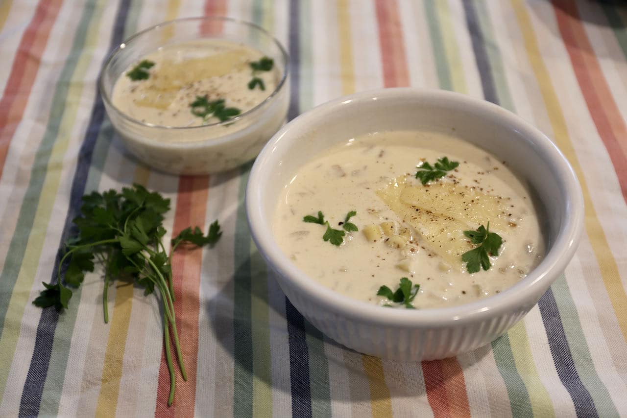 Serve Ditalini Soup topped with parsley, cracked black pepper and parmesan cheese.