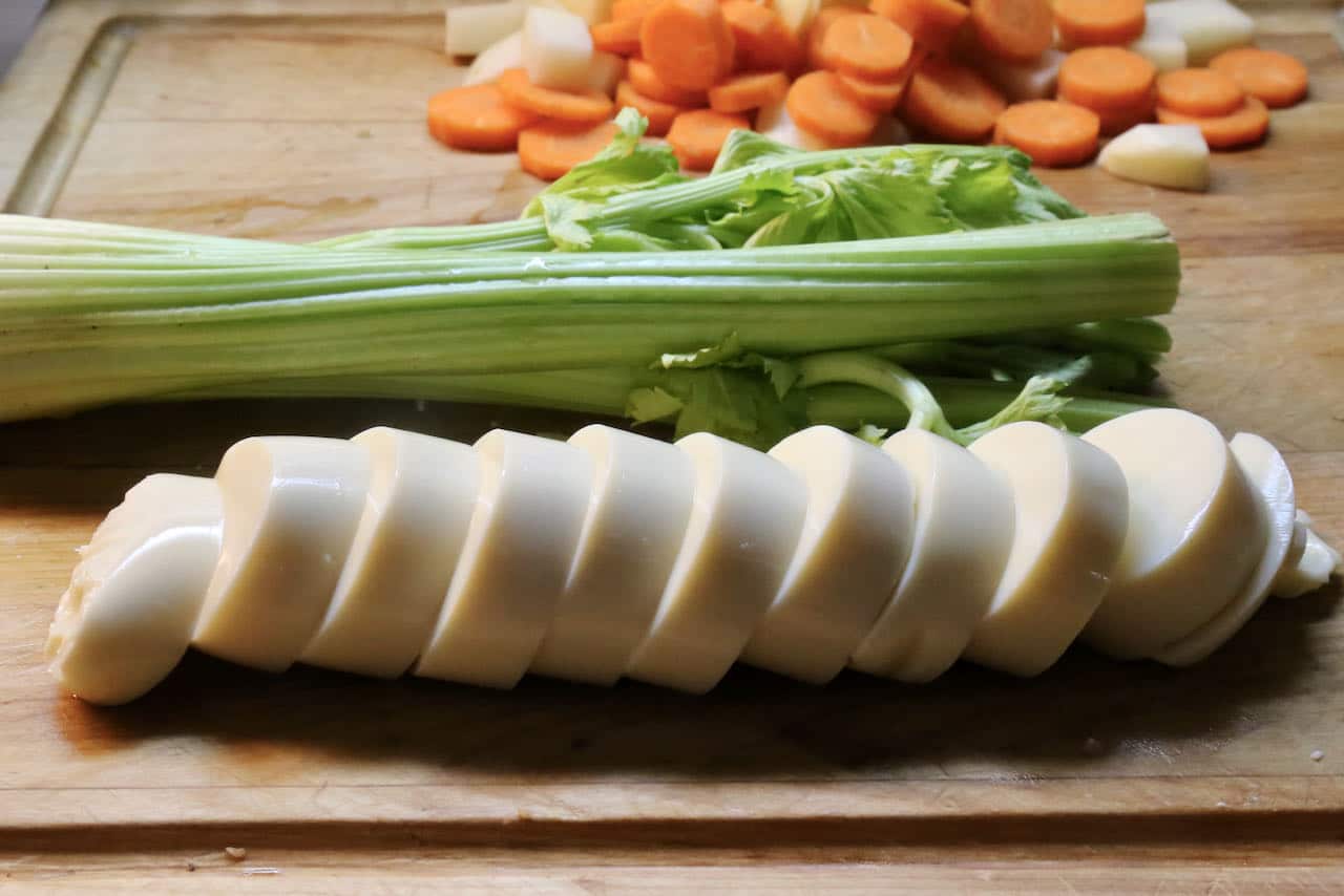 Slice egg tofu into thick slices and chop celery, carrots and potato.