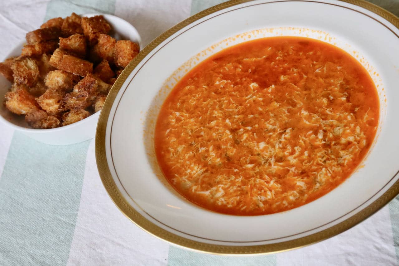 Serve our easy Spanish Soup recipe immediately in large bowls and garnish with crunchy paprika croutons.