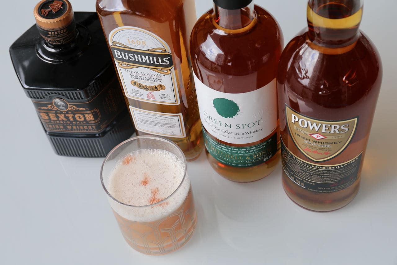The best authentic Irish Whiskey Sour features frothy egg white and a few drops of bitters.