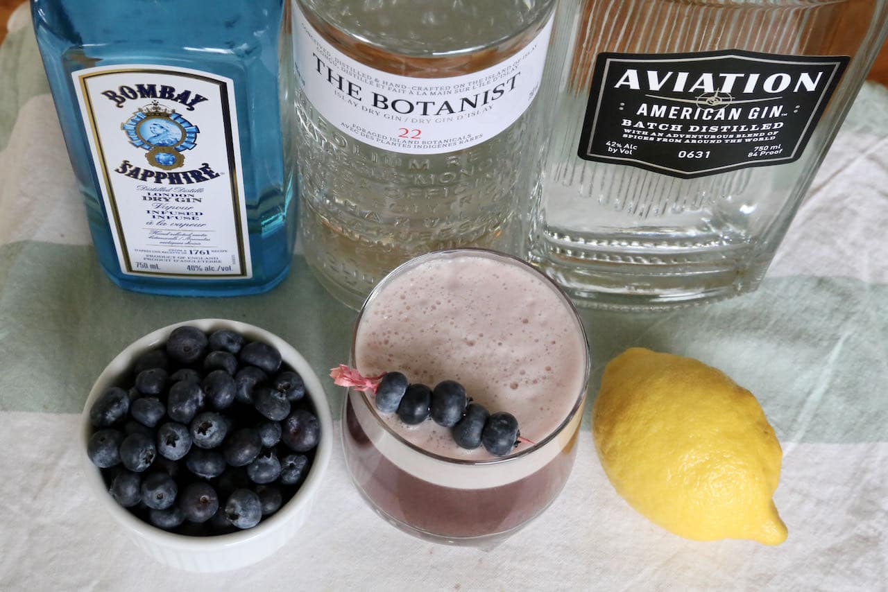 Our Blueberry Gin Sour Cocktail is garnished with fresh blueberries.