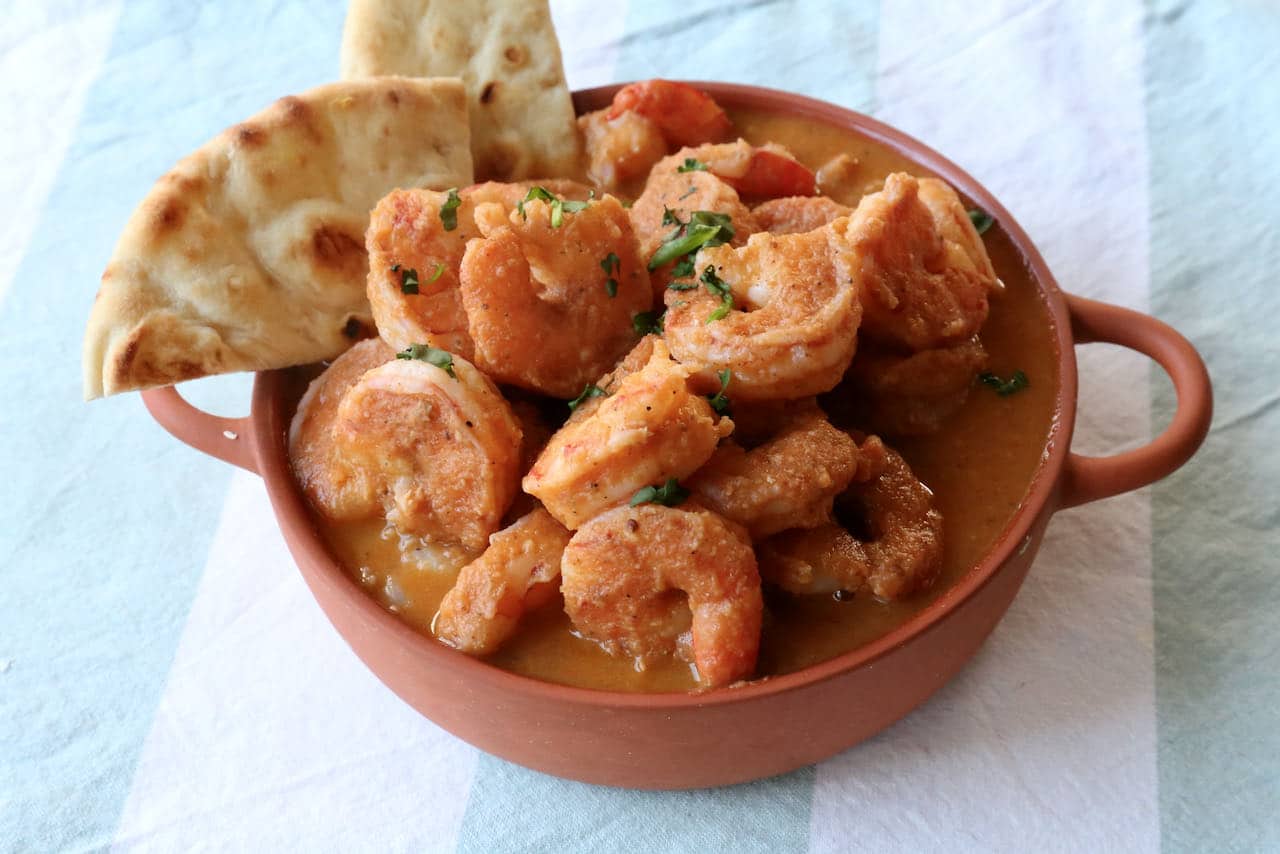 Chingri Malai Curry is one of our favourite traditional Indian seafood recipes with a creamy sauce.