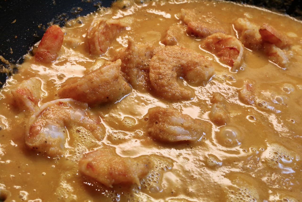 Plump prawns in Chingri Malai Curry sauce.