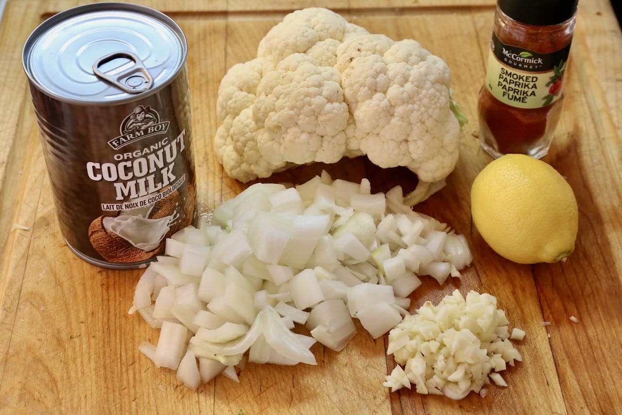 Our creamy Vegan Cauliflower Soup recipe features garlic, onion, lemon, paprika and coconut milk.