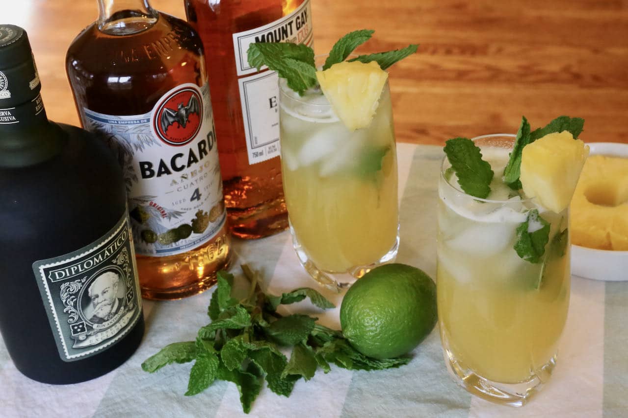 Our easy Pineapple Mojito recipe is garnished with fresh mint and pineapple slice.