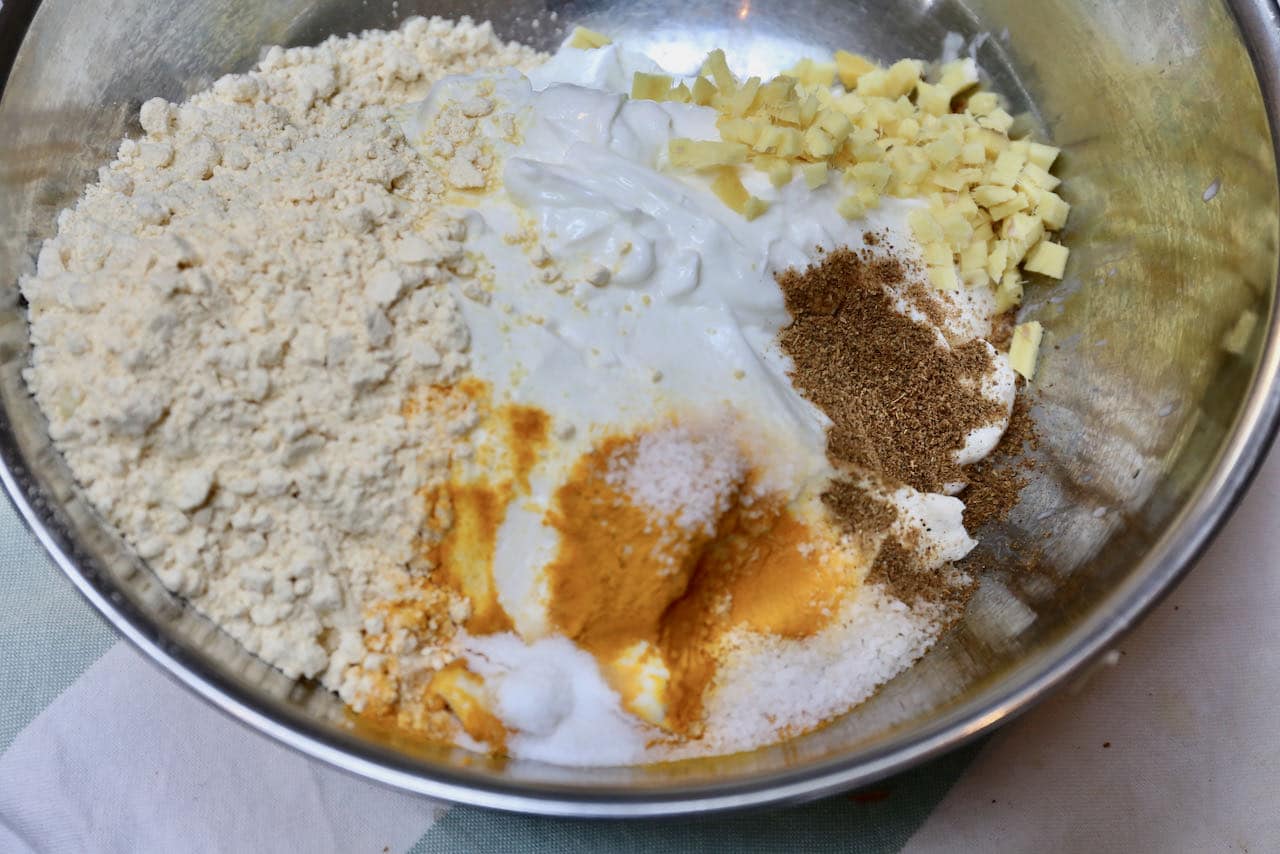 Mix Pitod Ki Sabji Chickpea Dumpling ingredients in a large bowl.