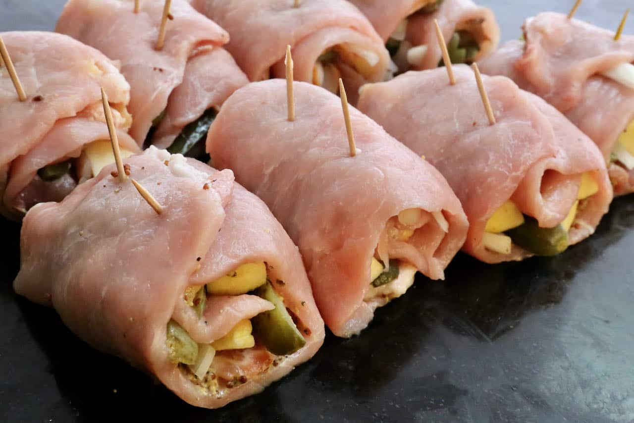 Pierce Pork Rouladen bundles with toothpicks to ensure they don't fall apart while cooking.