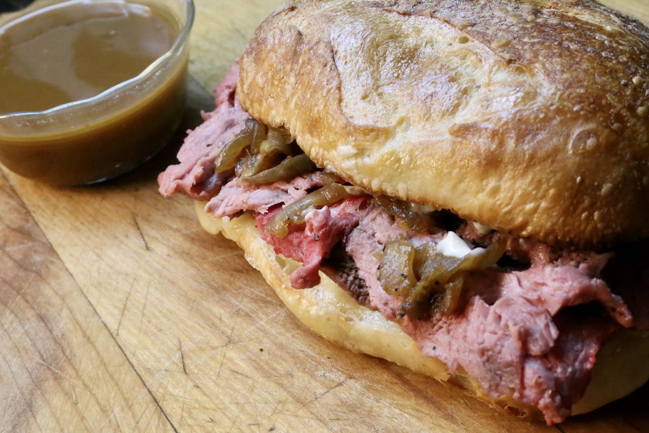 Serve this easy Prime Rib French Dip with beef jus for dipping.