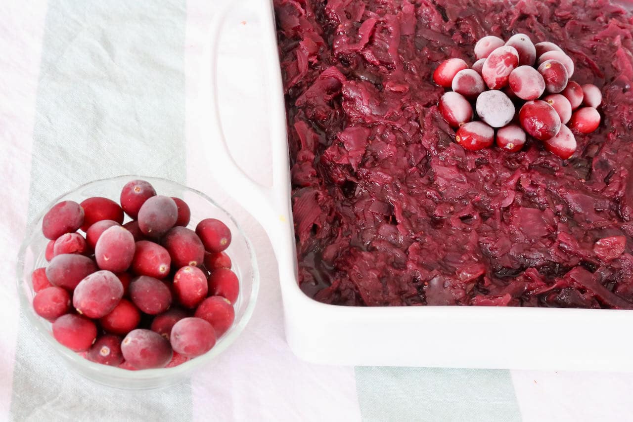 For a festive holiday side dish serve Slow Cooked Red Cabbage topped with frozen cranberries.