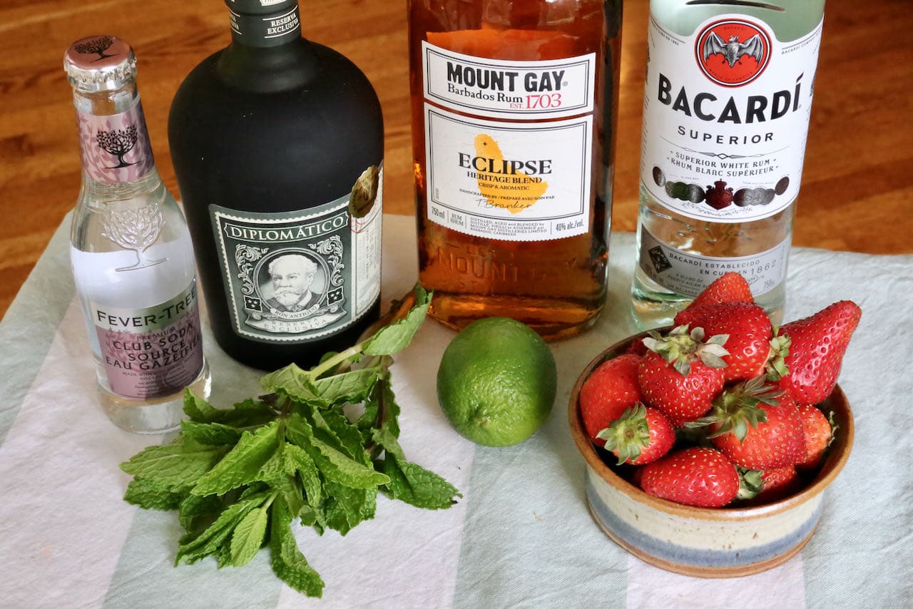 Strawberry Mojito recipe ingredients include fresh strawberries, lime, mint and soda.