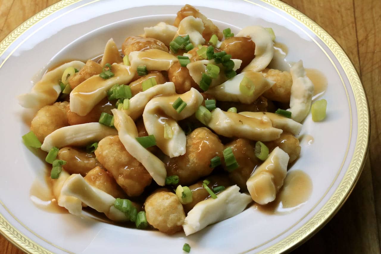 You can make vegetarian tater tot poutine by using a meat-free gravy.