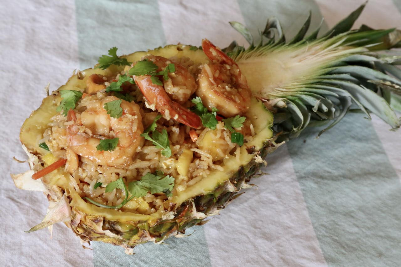 Serve this Khao Pad recipe out of a pineapple to delight your dinner guests!