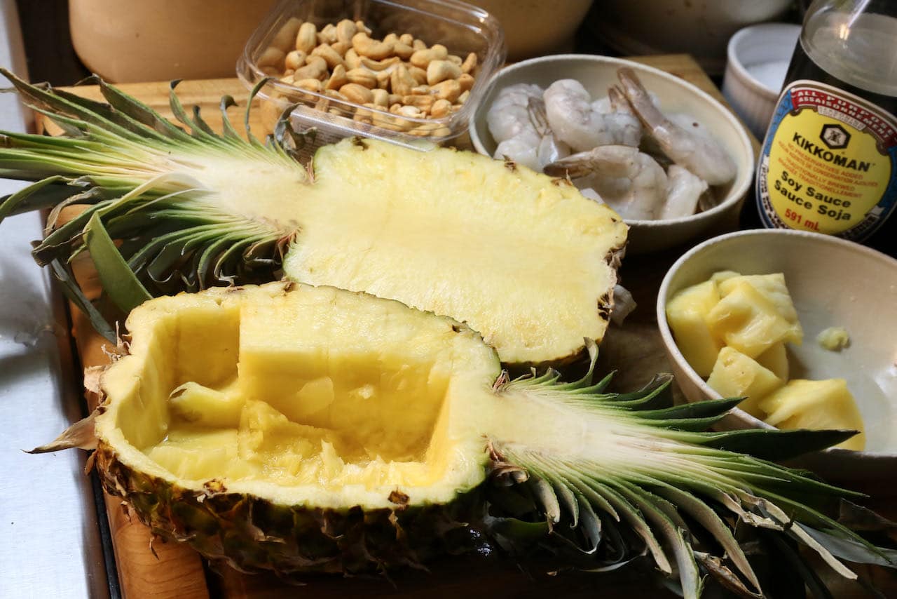The best Khao Pad Sapparod recipe is served out of a pineapple that is halved lengthwise. 