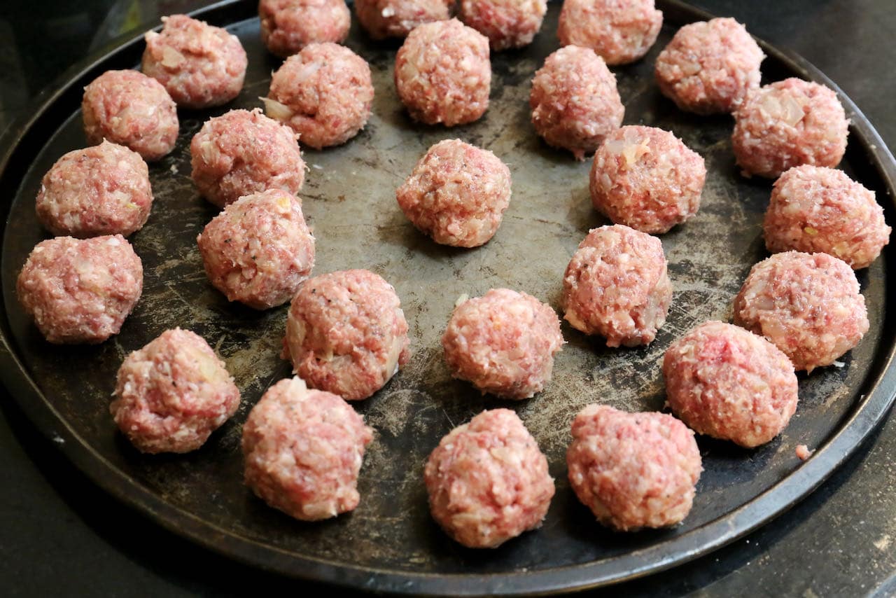 Rest Köttbullar Swedish Meatballs on a baking tray until ready to fry.