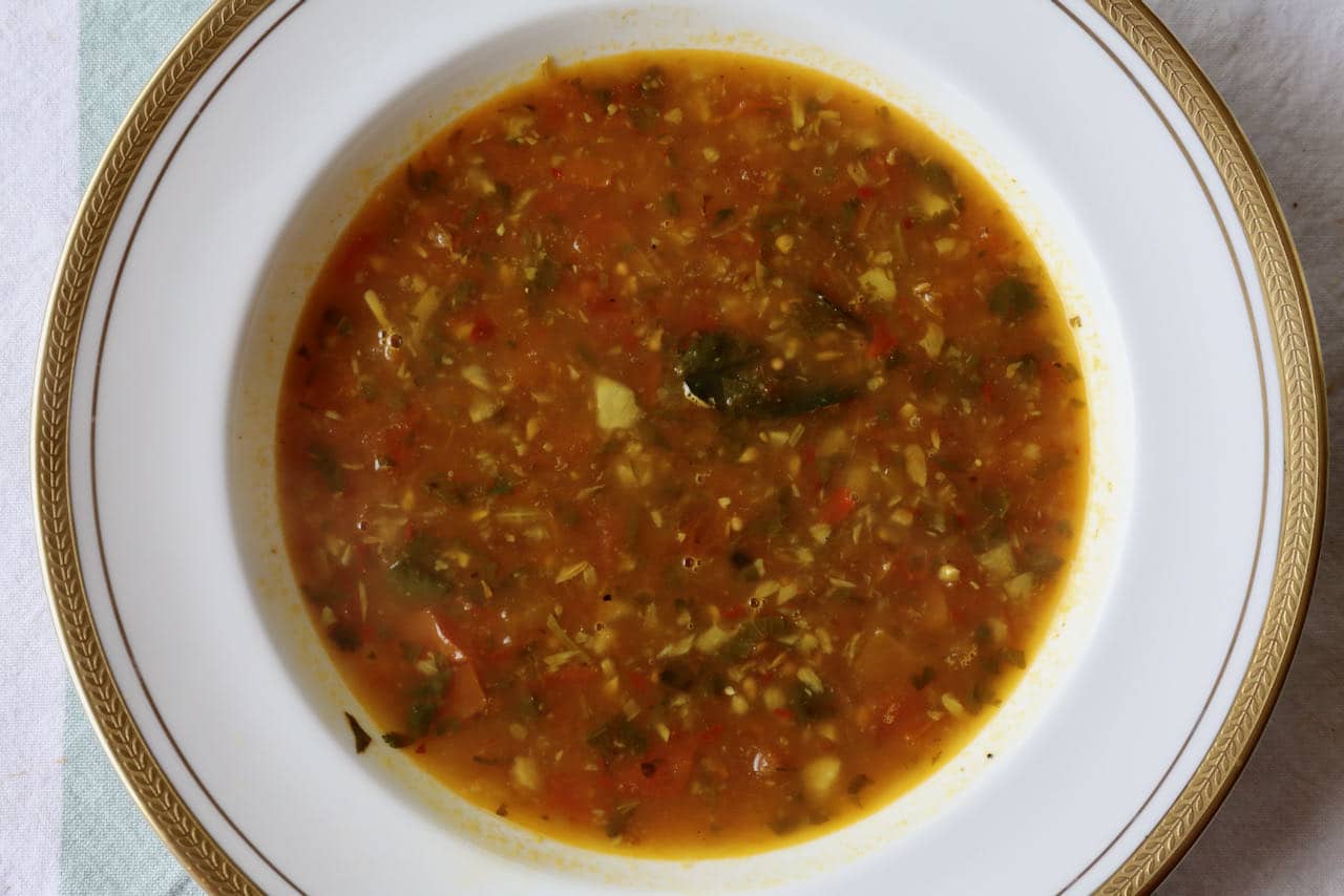 Serve Milagu Rasam South Indian Soup with basmati rice.