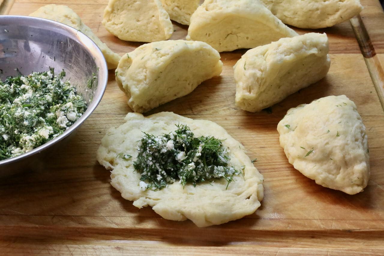 Turkish Bread Rolls are stuffed with fresh dill and crumbled feta cheese.