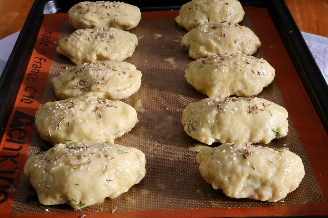 Authentic Turkish Pogaca are sprinkled with sesame and caraway seeds.