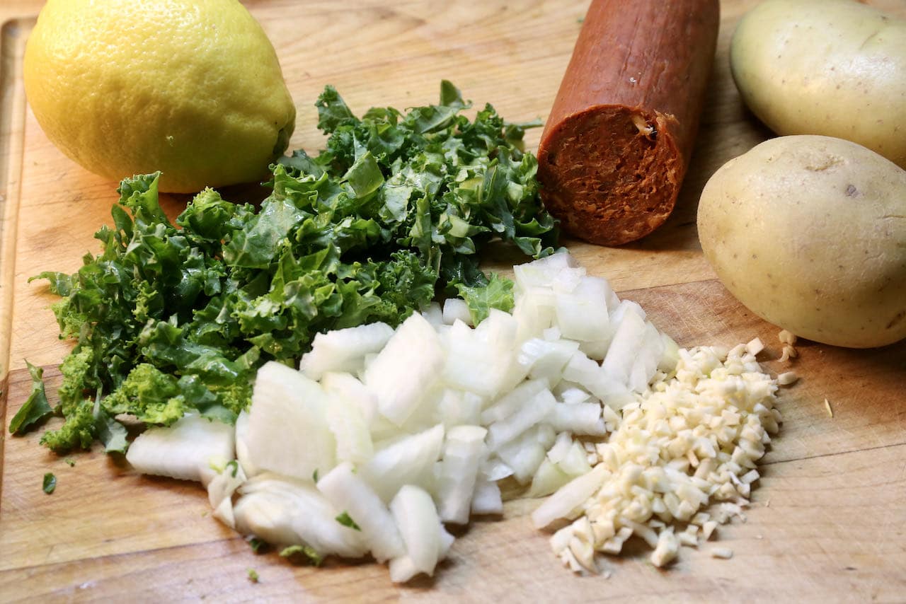 Portuguese Bean Soup features garlic, onion, potato, kale, lemon zest and chorizo sausage.