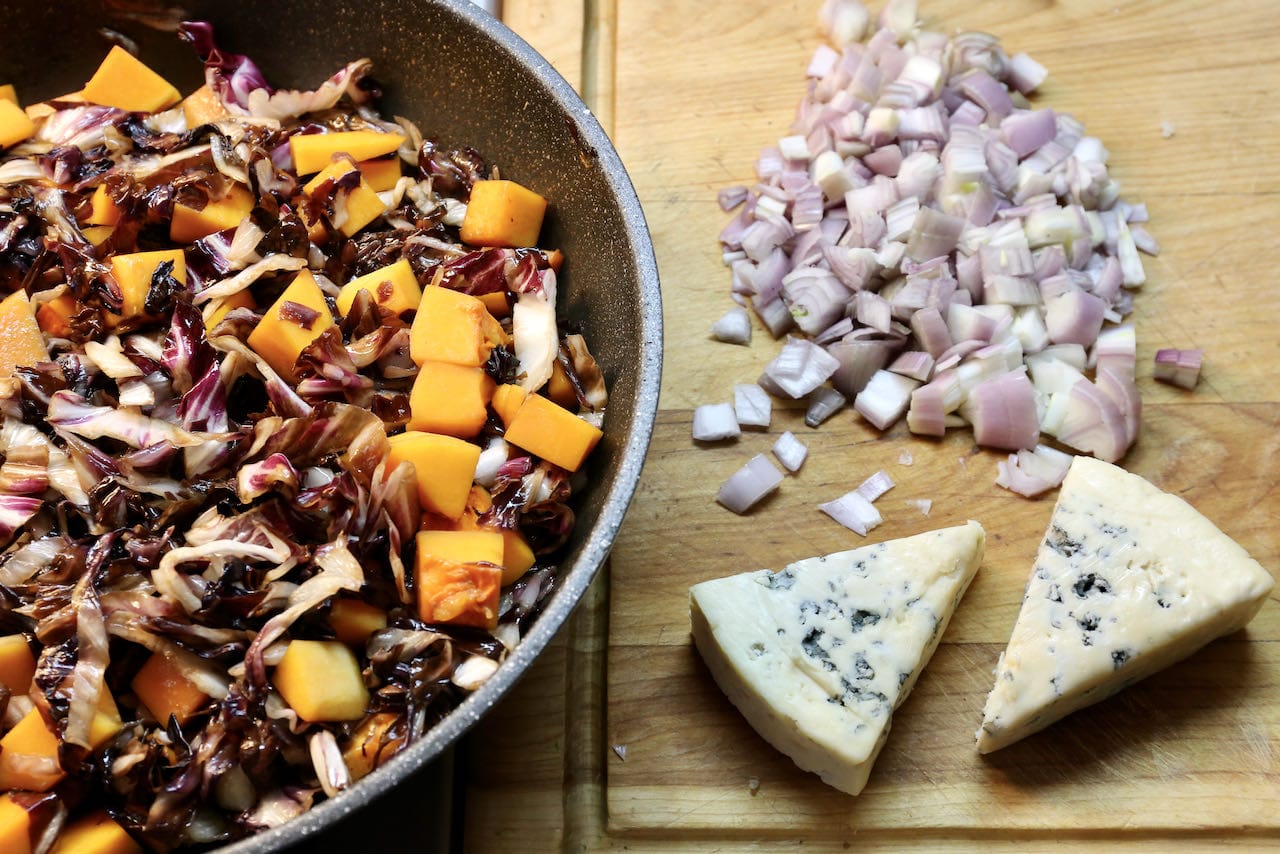 This easy Gorgonzola Risotto recipe features sliced radicchio, squash, chopped shallots and blue cheese.