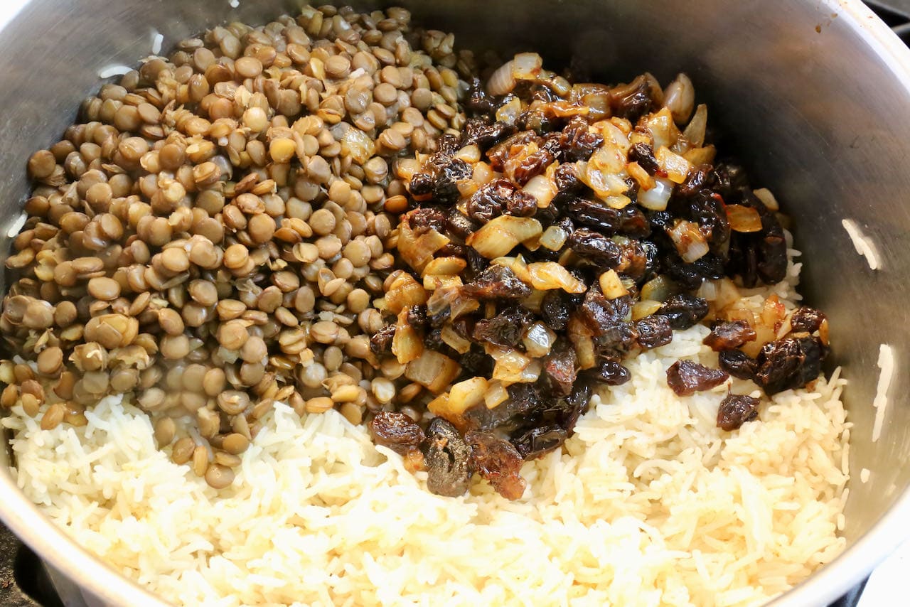 Adas Polo is a Persian dish featuring rice, lentils and a spiced onion and dried fruit mixture.