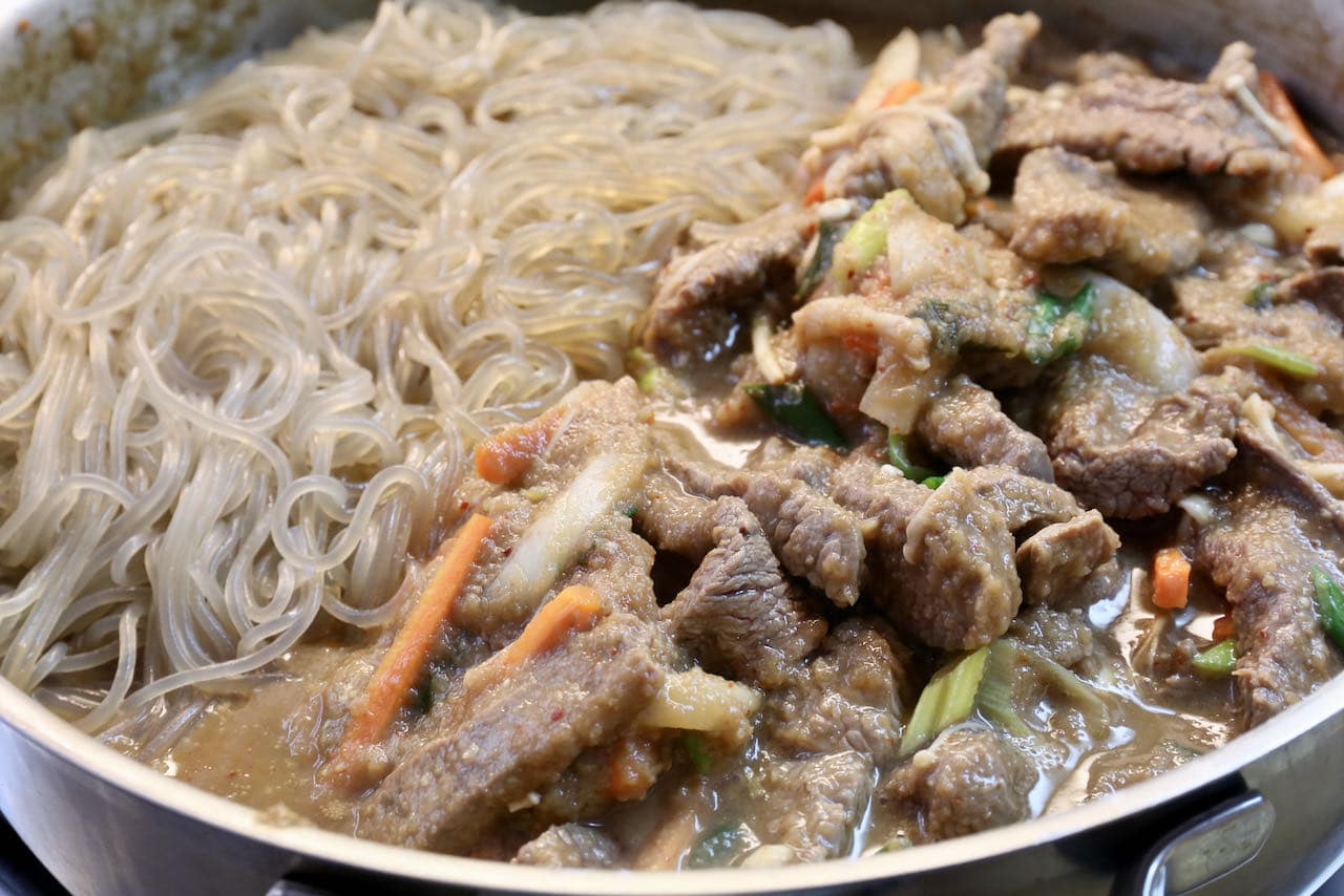 Toss Beef Bulgogi with Korean cellophane glass noodles. 