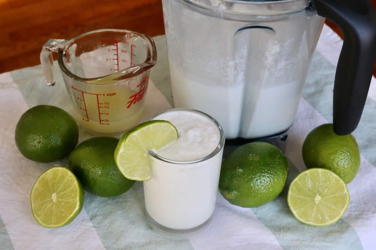Prepare Limonada de Coco in a blender to create a classic creamy Colombian drink.