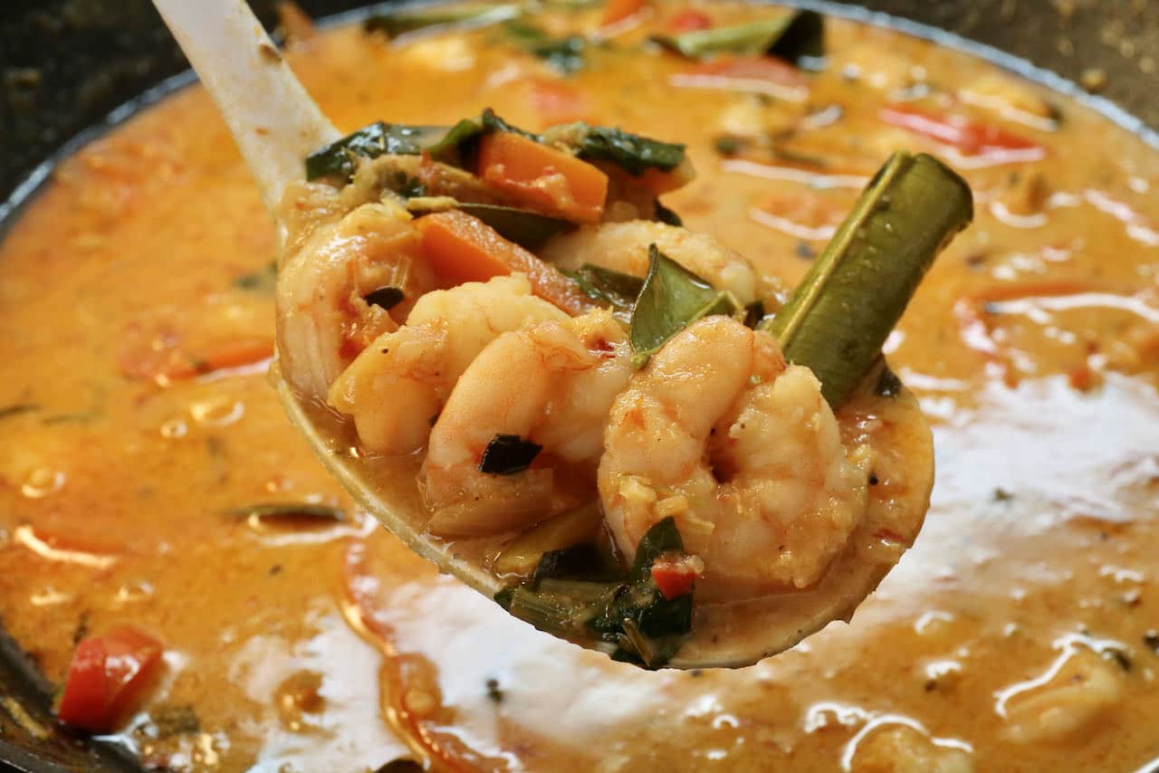 Serve Prawn Panang Curry as a main course at a Thai dinner party.