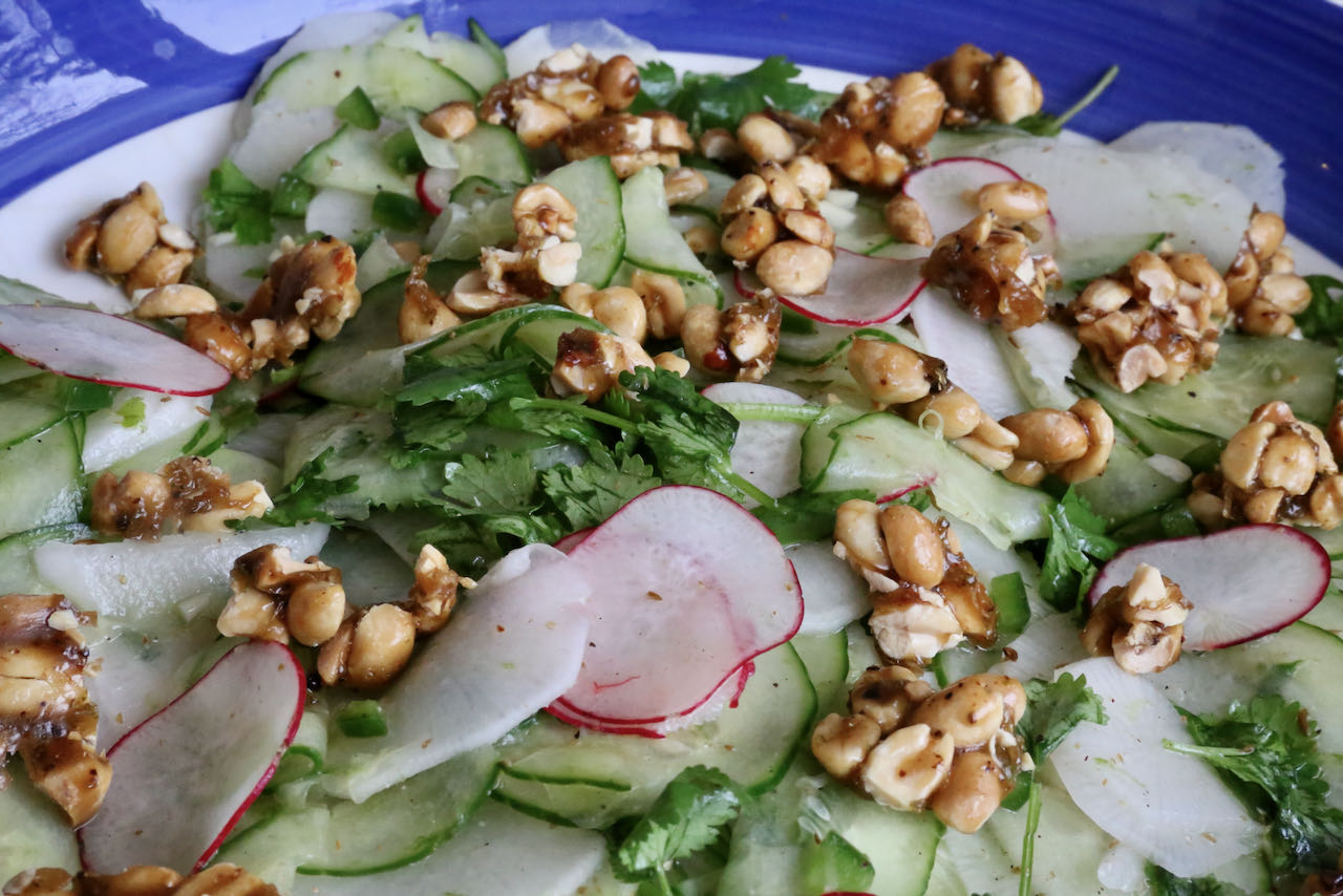 Crunchy Vegan Cucumber Salad features juicy vegetables contrasted with sweet and spicy peanuts. 
