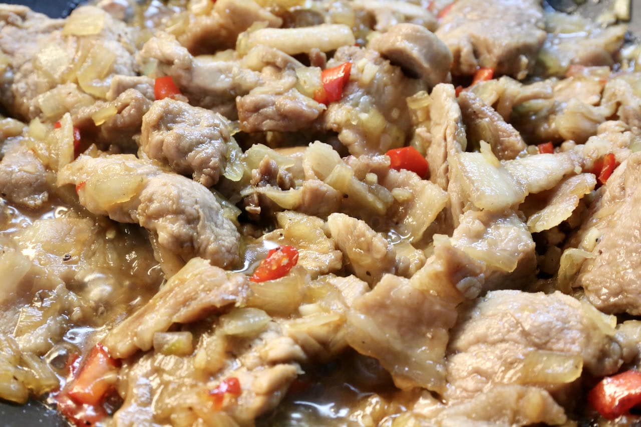 Cook Thit Ram ingredients until pork is cooked through and tender. 