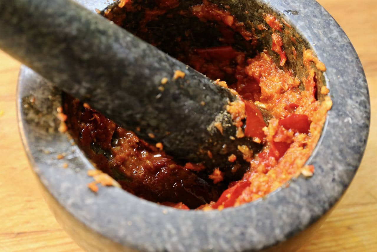 Spicy Thai Food typically gets its heat from curry paste made in a mortar and pestle. 