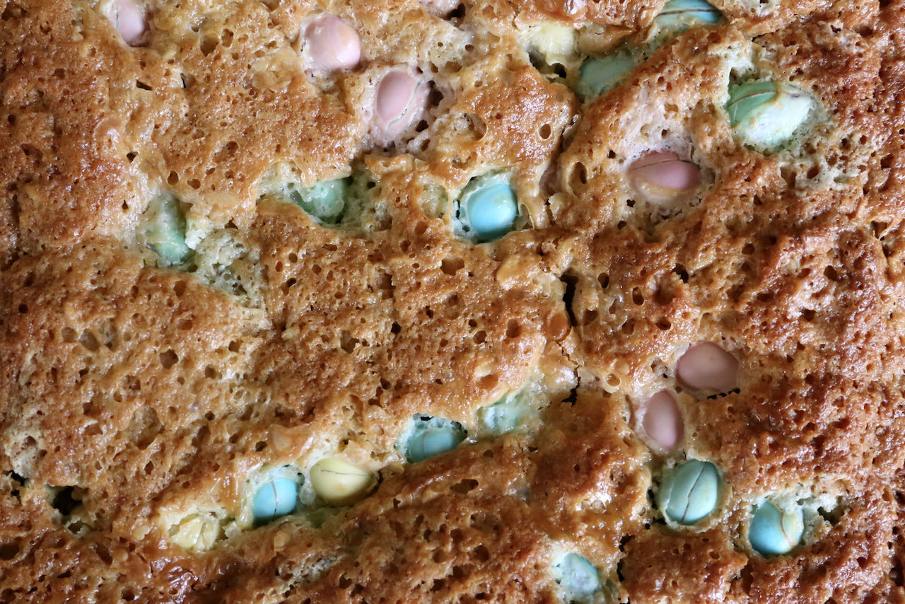 Mini Egg Cookie Bars feature Easter colours like blue, pink, yellow and green. 